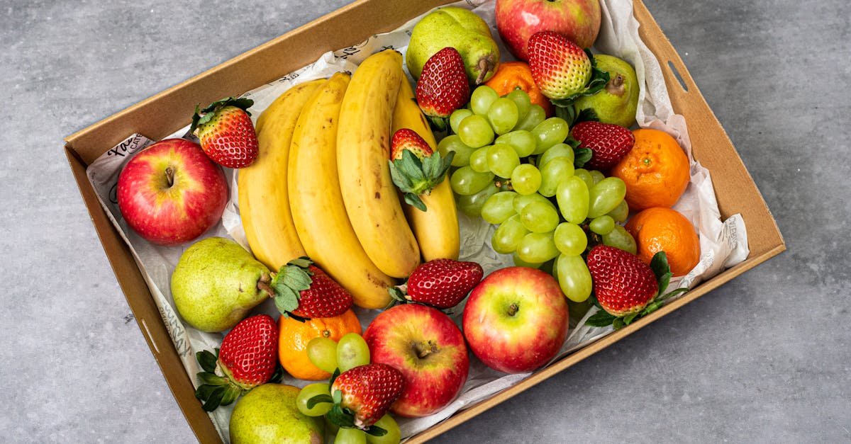 A delicious assortment of fresh fruits including apples, bananas, strawberries, and grapes.